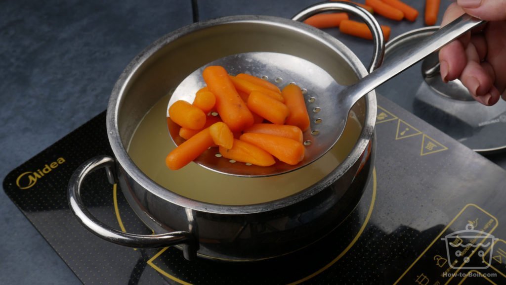 baby carrots on a skimmer